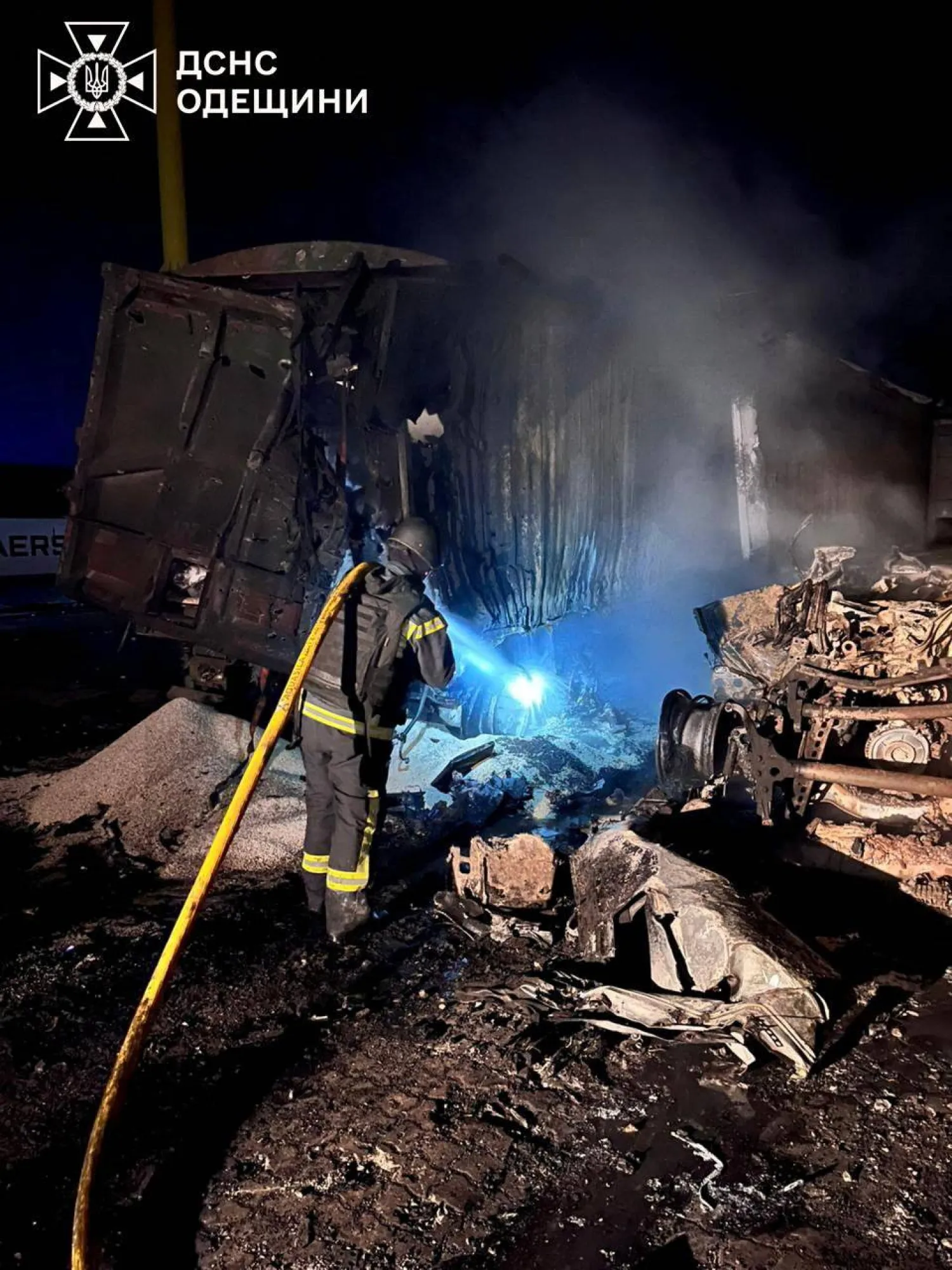 A firefighter works at the site of a Russian missile and drone strike, amid Russia's attack on Ukraine, in Odesa region, Ukraine in this handout picture released December 20, 2025. Press service of the State Emergency Service of Ukraine in Odesa region/Handout via REUTERS 