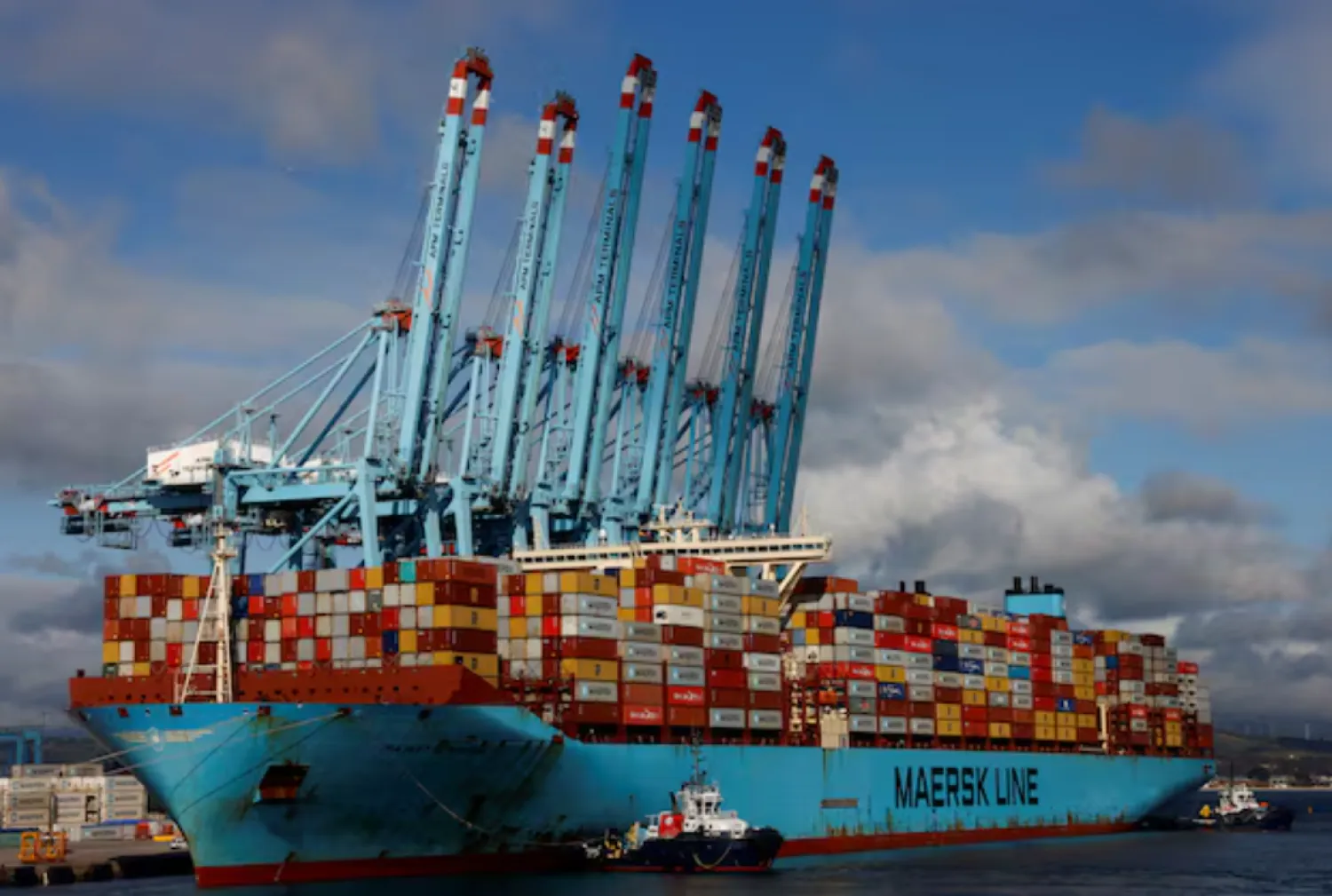 Containers are seen on the Maersk Triple-E giant container ship Majestic Maersk, one of the world's largest container ships, next to cranes at the APM Terminals in the port of Algeciras, Spain, January 20, 2023. REUTERS/Jon Nazca/File Photo P