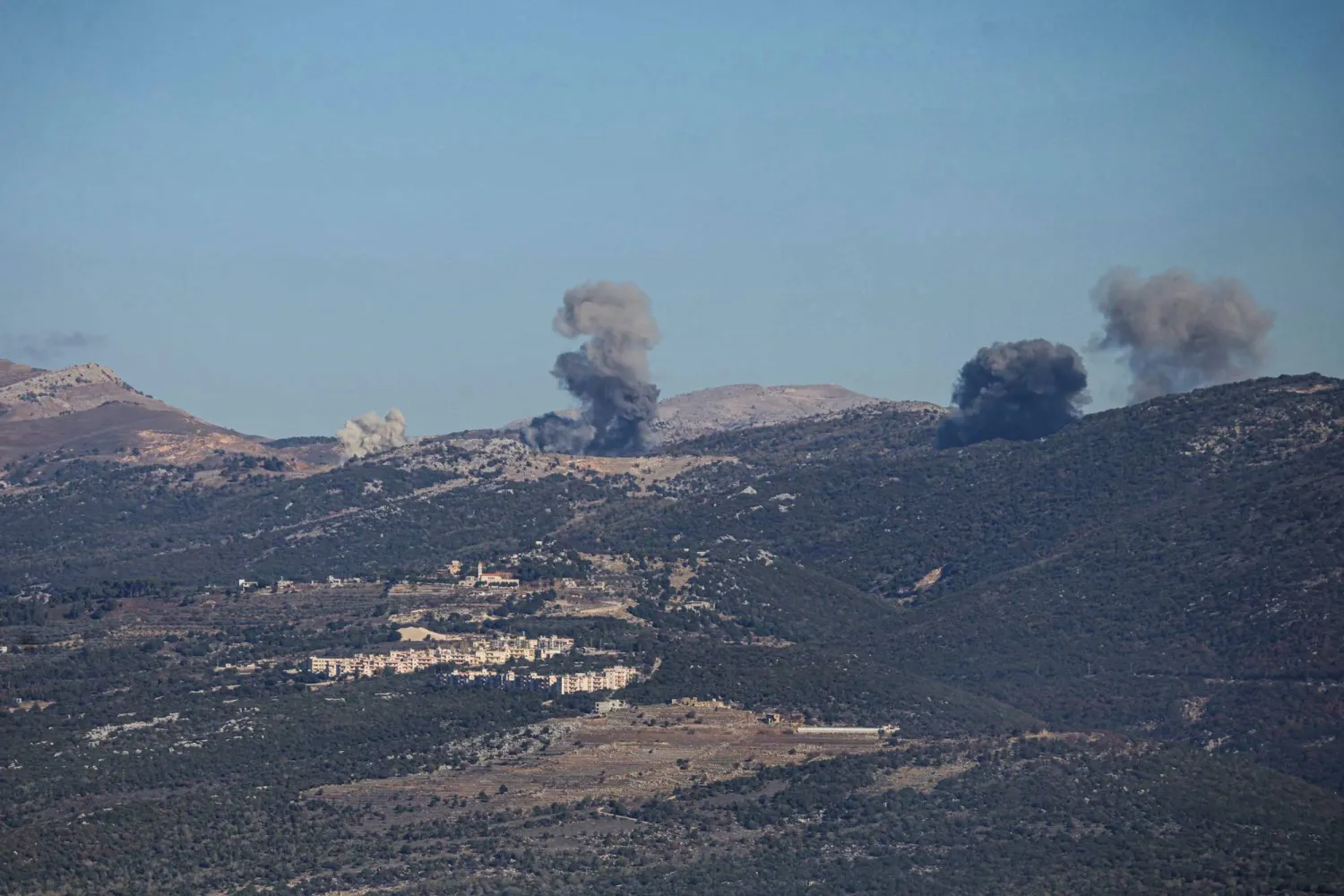 Smoke rises from the site of a series of Israeli airstrikes that targeted the outskirts of the southern Lebanese village of al-Katrani on December 18, 2025. (AFP)