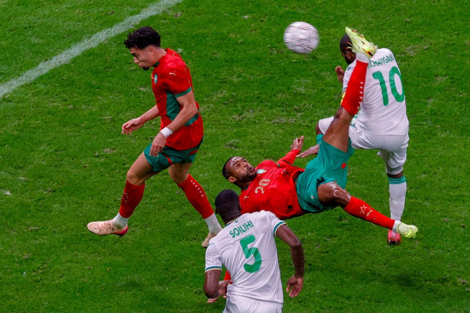 Morocco's forward #20 Ayoub El Kaabi scores a goal during the Africa Cup of Nations (CAN) group A  football match between Morocco and Comoros at Prince Moulay Abdellah Stadium in Rabat on December 21, 2025. (Photo by Abdel Majid BZIOUAT / AFP)