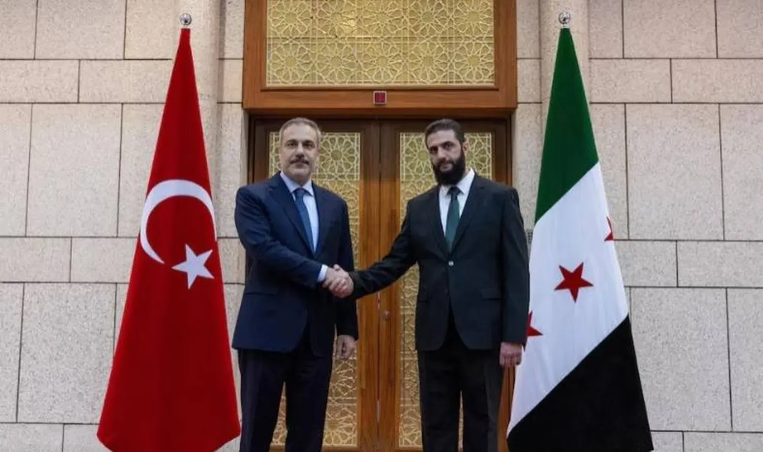 Şam’da bir araya gelen Ahmed Şara ve Hakan Fidan görüşmesinden bir kare  (Arşiv-Reuters)