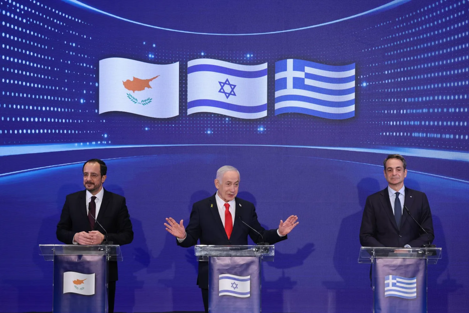 Israeli Prime Minister Benjamin Netanyahu (C), Cypriot President Nikos Christodoulides (L) and Greek Prime Minister Kyriakos Mitsotakis (R) hold a joint press conference after a trilateral meeting at the Citadel of David Hotel in Jerusalem, 22 December 2025. EPA/ABIR SULTAN / POOL