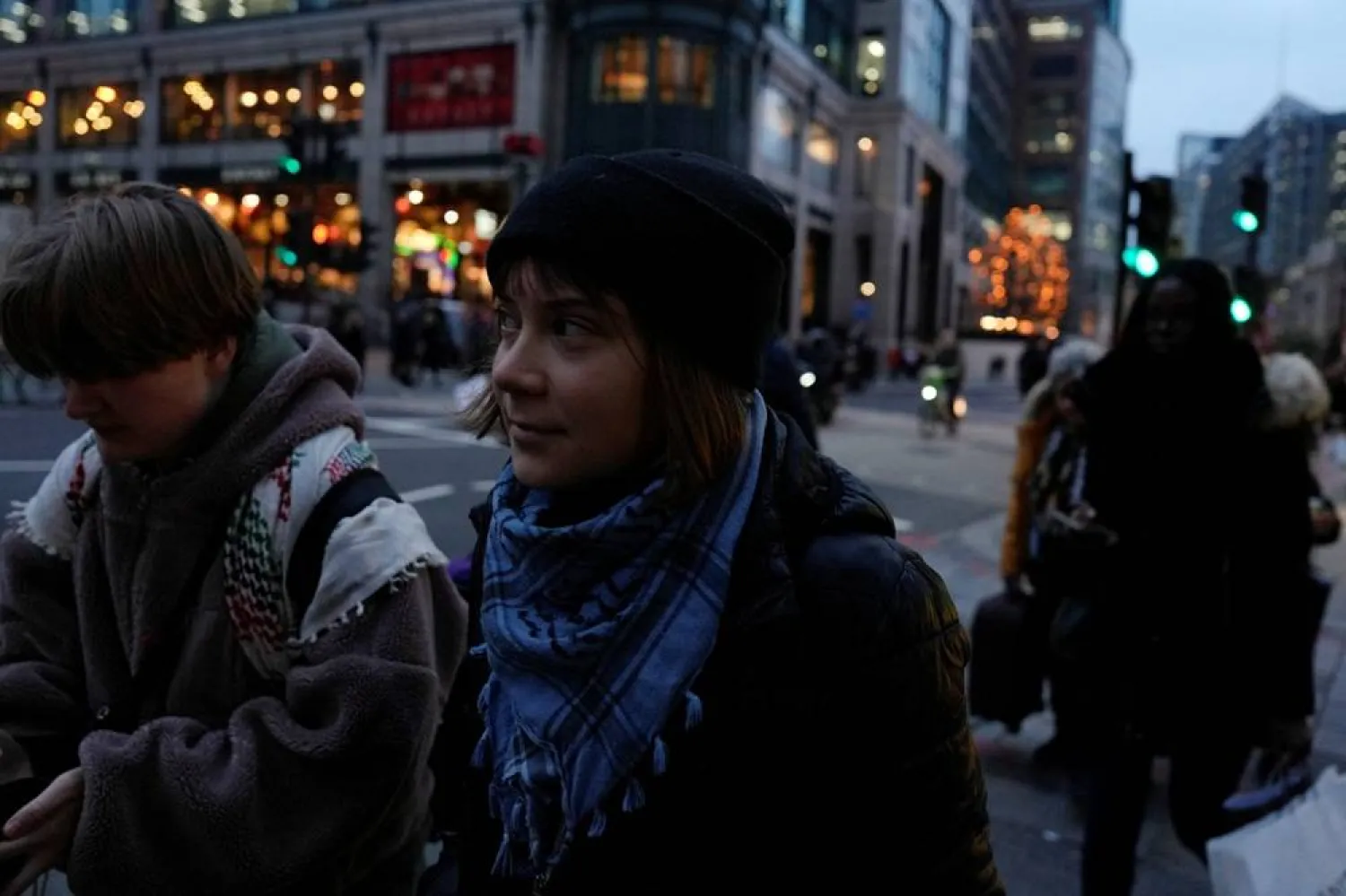 Swedish activist Greta Thunberg walks out of City of London Police station after being arrested by police this morning at a pro‑Palestinian protest, in London, Britain, December 23, 2025. (Reuters) 