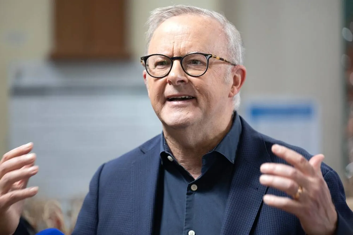 Australian Prime Minister Anthony Albanese speaks to the media during a Christmas lunch hosted by the Rev Bill Crews Foundation, in Sydney, Australia, 25 December 2025. (EPA) 