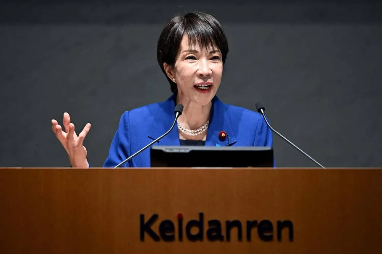 Japan's Prime Minister Sanae Takaichi delivers a speech at the 14th Council Meeting of the Japan Business Federation, or Keidanren, in Tokyo on December 25, 2025. (AFP) 