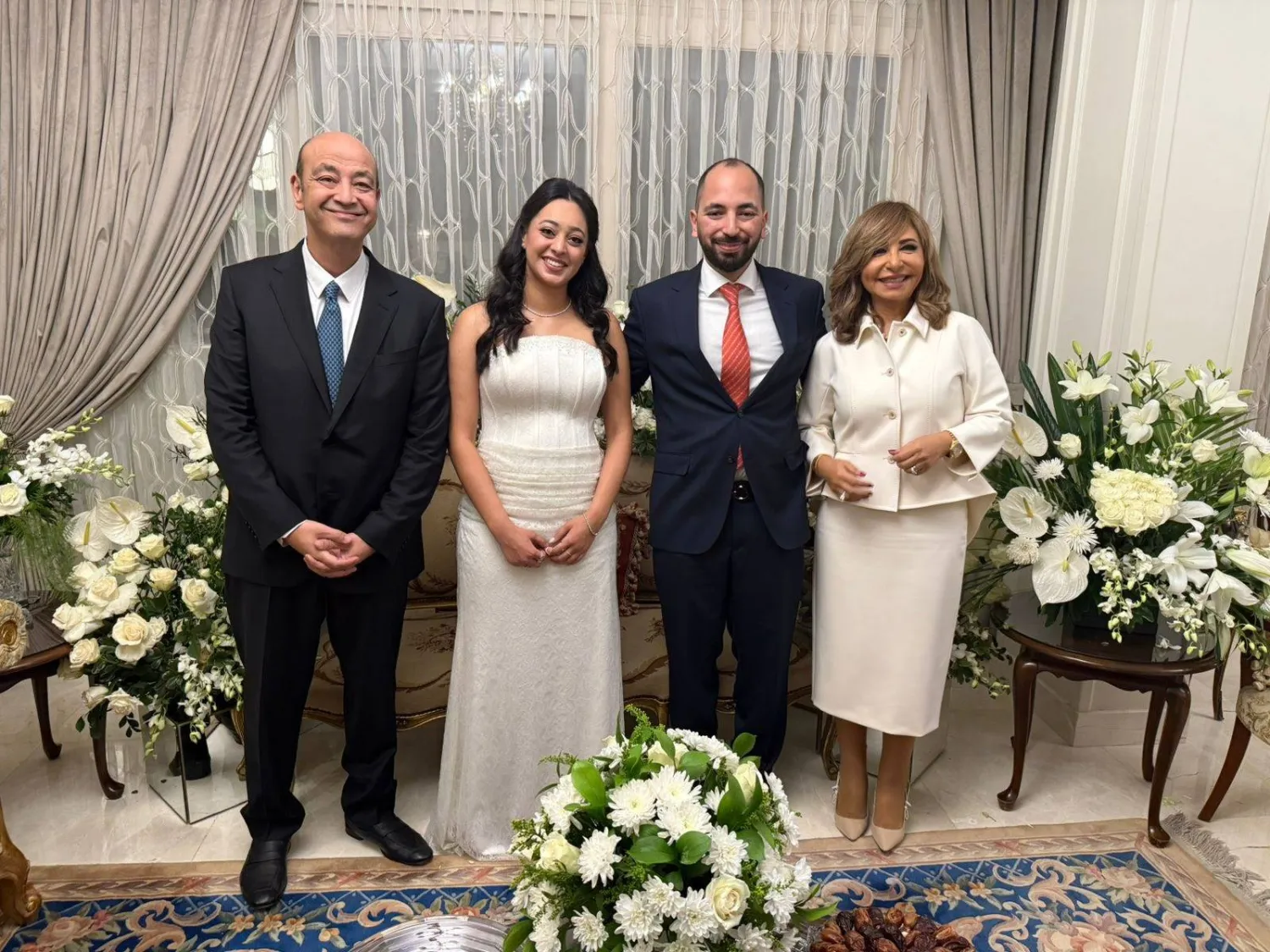 خلال آخر ظهور للثنائي في خطوبة نجلهما (فيسبوك)