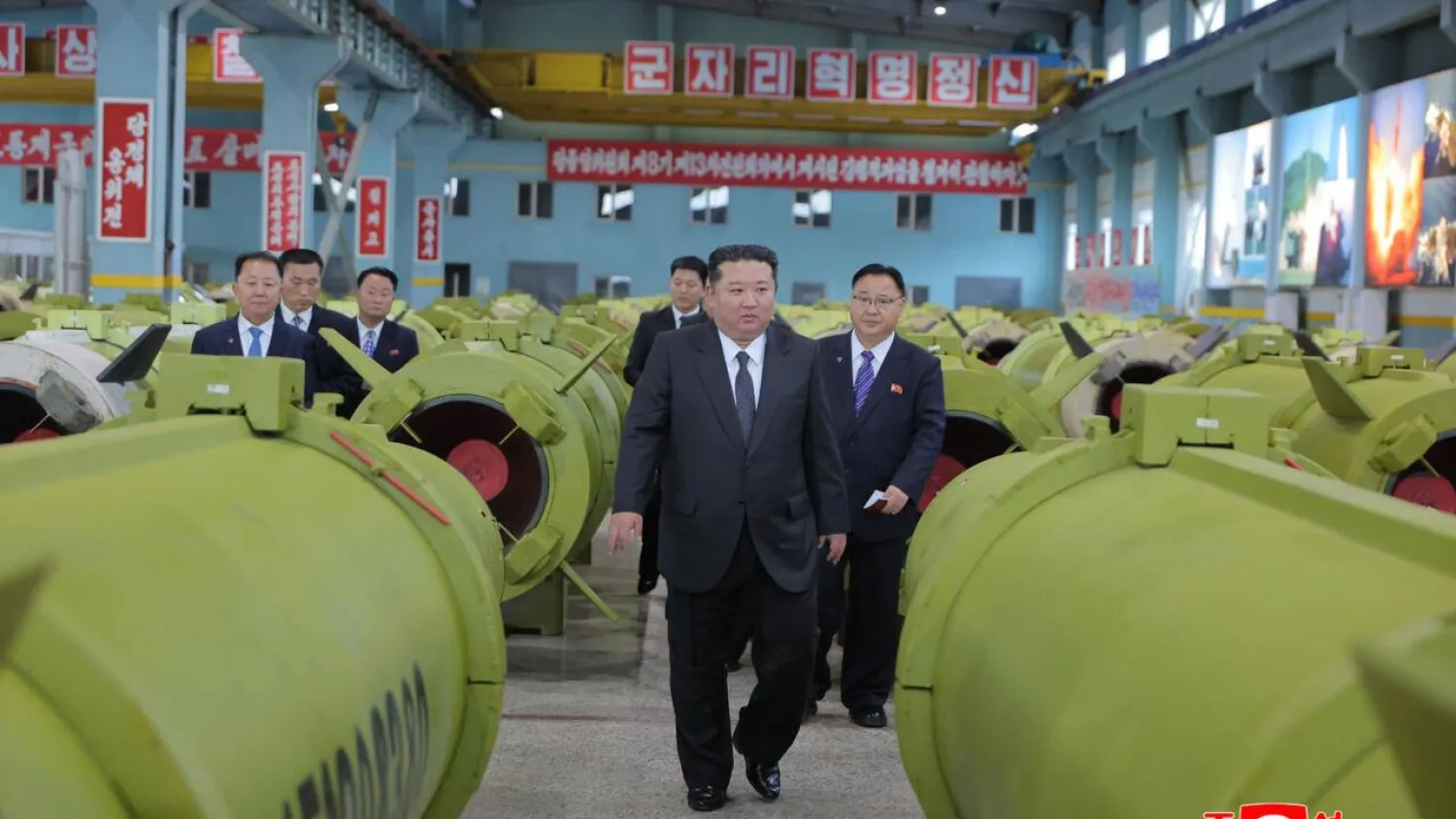 In a visit to munitions factories accompanied by top officials, the state-run Korean Central News Agency (KCNA) said Kim ordered the factories to prepare for a busy year ahead. STR / KCNA VIA KNS/AFP
