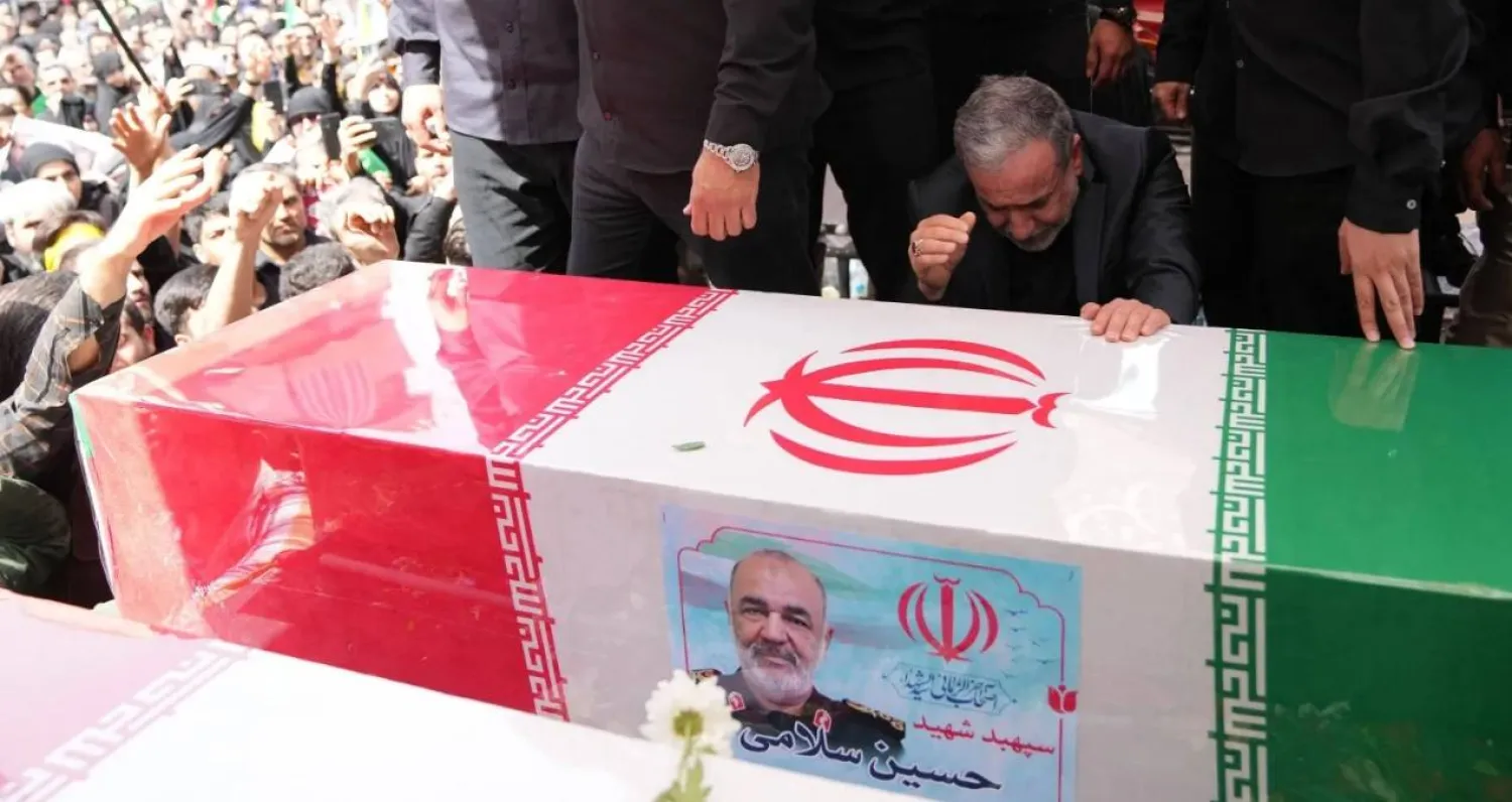 Iranian Foreign Minister Abbas Araghchi weeps over the coffin of Hossein Salami, commander of the Revolutionary Guard Corps, during the funeral of senior military officials killed in Israeli strikes in Tehran on June 28. AFP/Archive