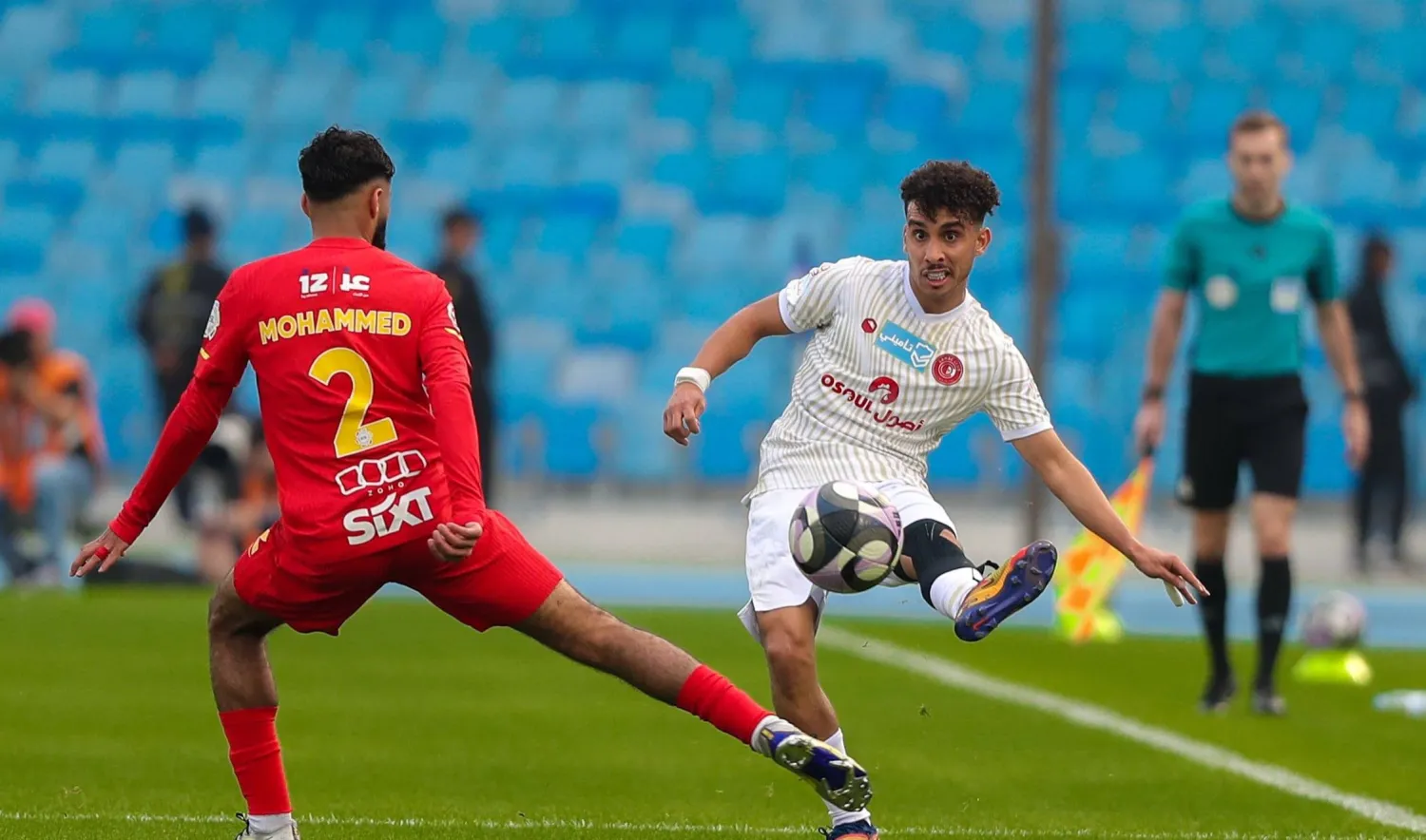 من المواجهة التي جمعت القادسية وضمك في الدمام (نادي ضمك)