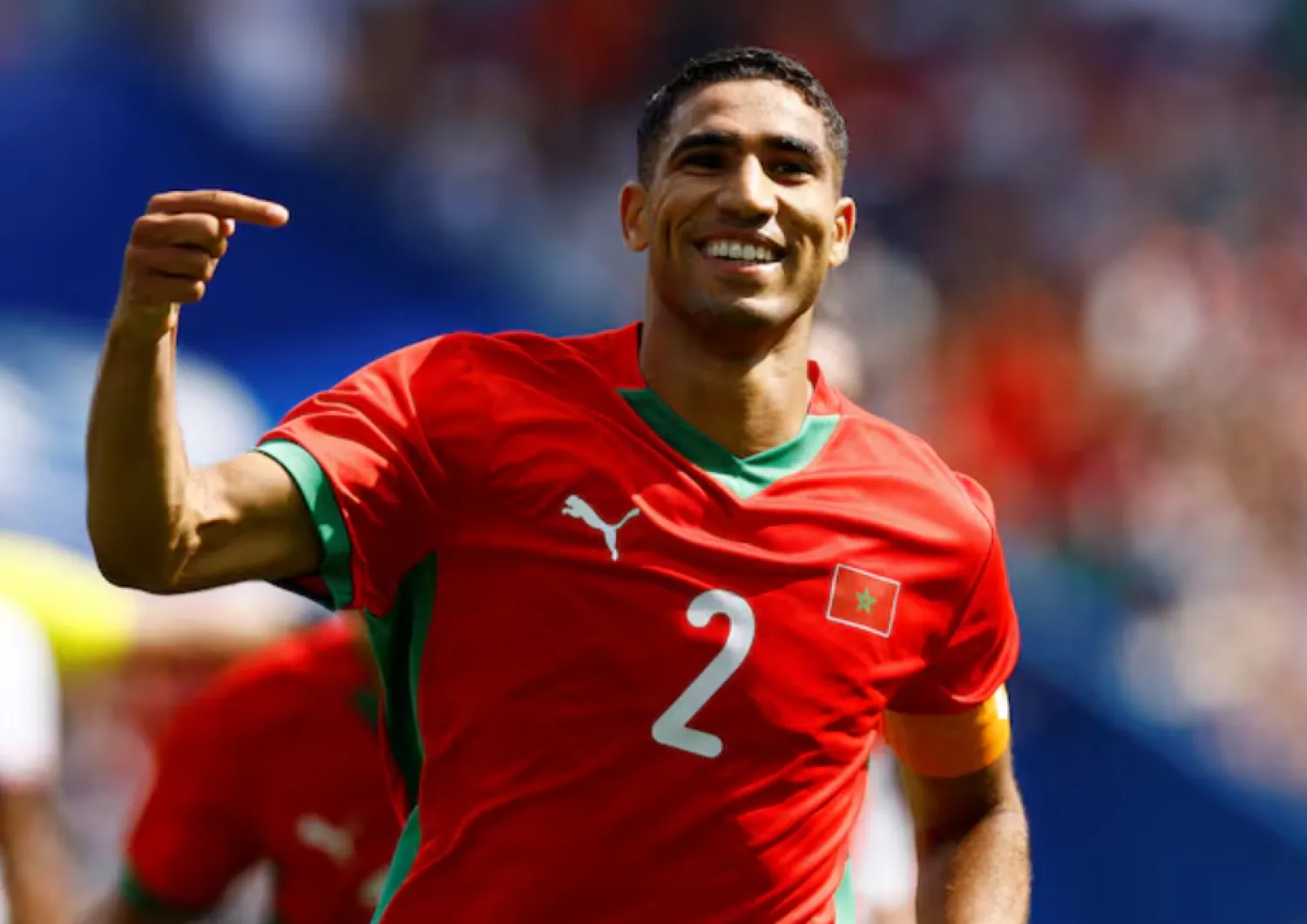 Paris 2024 Olympics - Football - Men's Quarter-final - Morocco vs United States - Parc des Princes, Paris, France - August 02, 2024. Achraf Hakimi of Morocco celebrates scoring their third goal. REUTERS