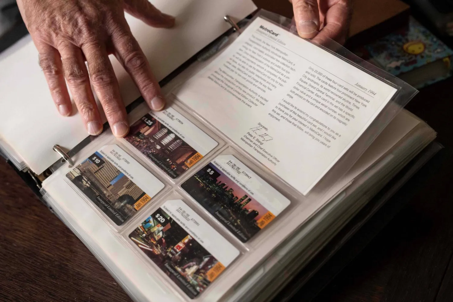 Lev Radin, a MetroCard collector, shows his collection of Inaugural Limited Edition MetroCards, Dec. 10, 2025, in New York. (AP Photo/Yuki Iwamura)