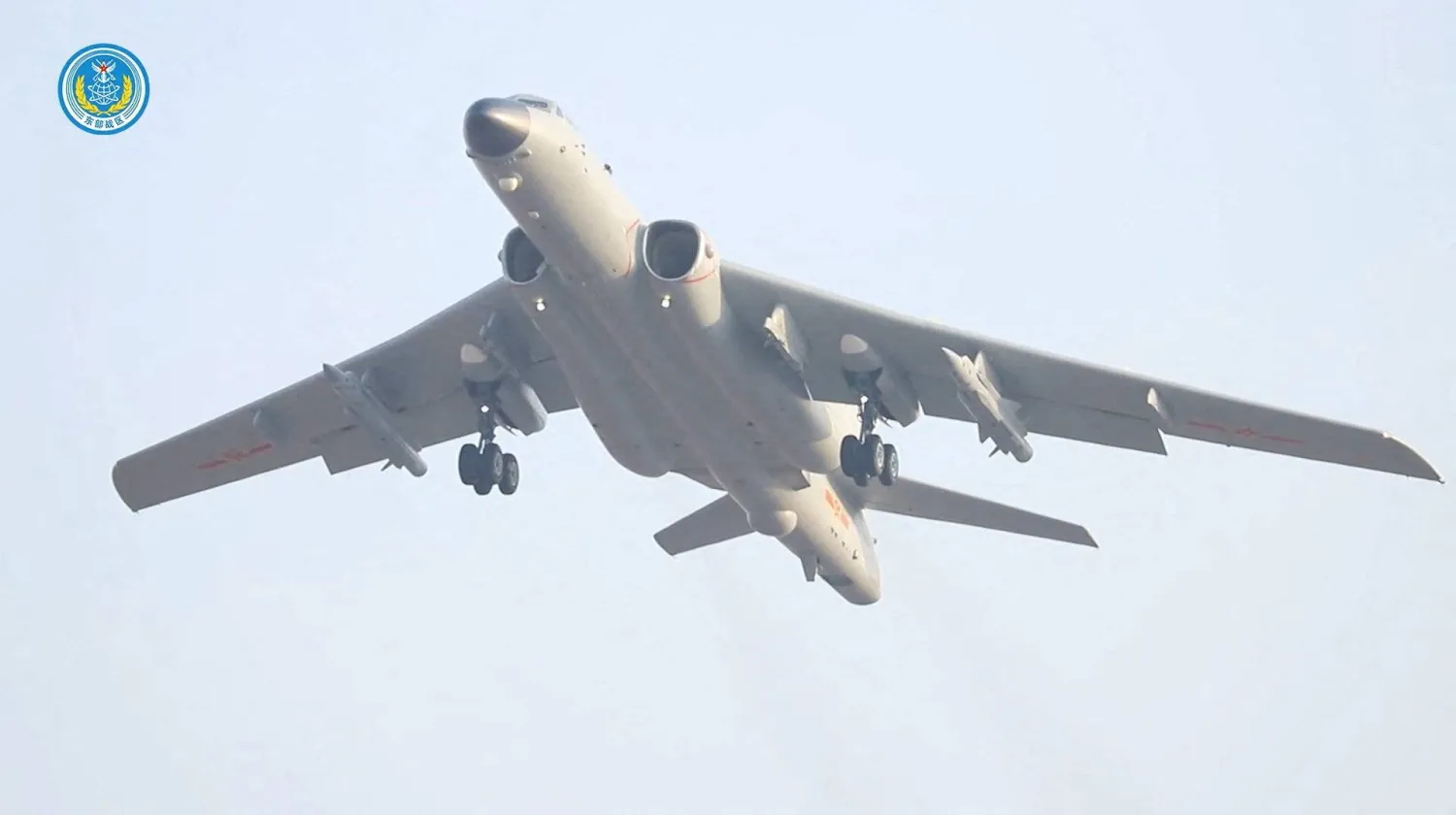 صورة من شريط فيديو لقاذفة صينية تقلع من مكان غير محدد للمشاركة في المناورات حول تايوان الاثنين (رويترز)