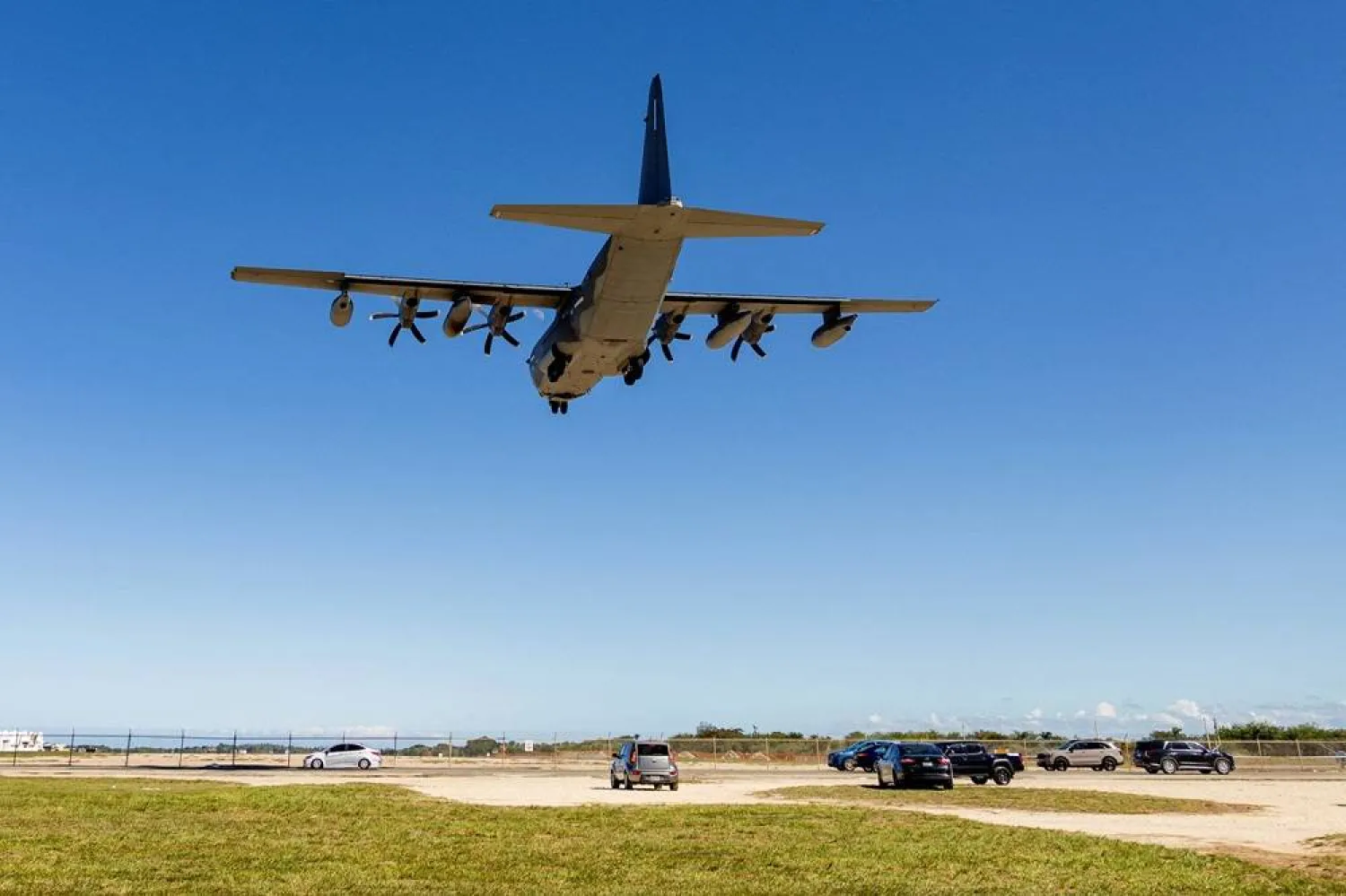 A US Air Force C-130J Super Hercules aircraft approaches for landing at Rafael Hernandez Airport, amid tensions between US President Donald Trump's administration and the government of Venezuelan President Nicolas Maduro, in Aguadilla, Puerto Rico, December 28, 2025. (Reuters) 
