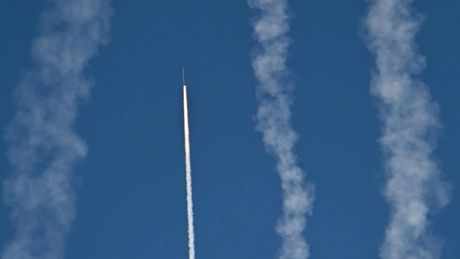 A rocket launches from Pingtan island in eastern China's Fujian province, the closest point to Taiwan. ADEK BERRY / AFP
