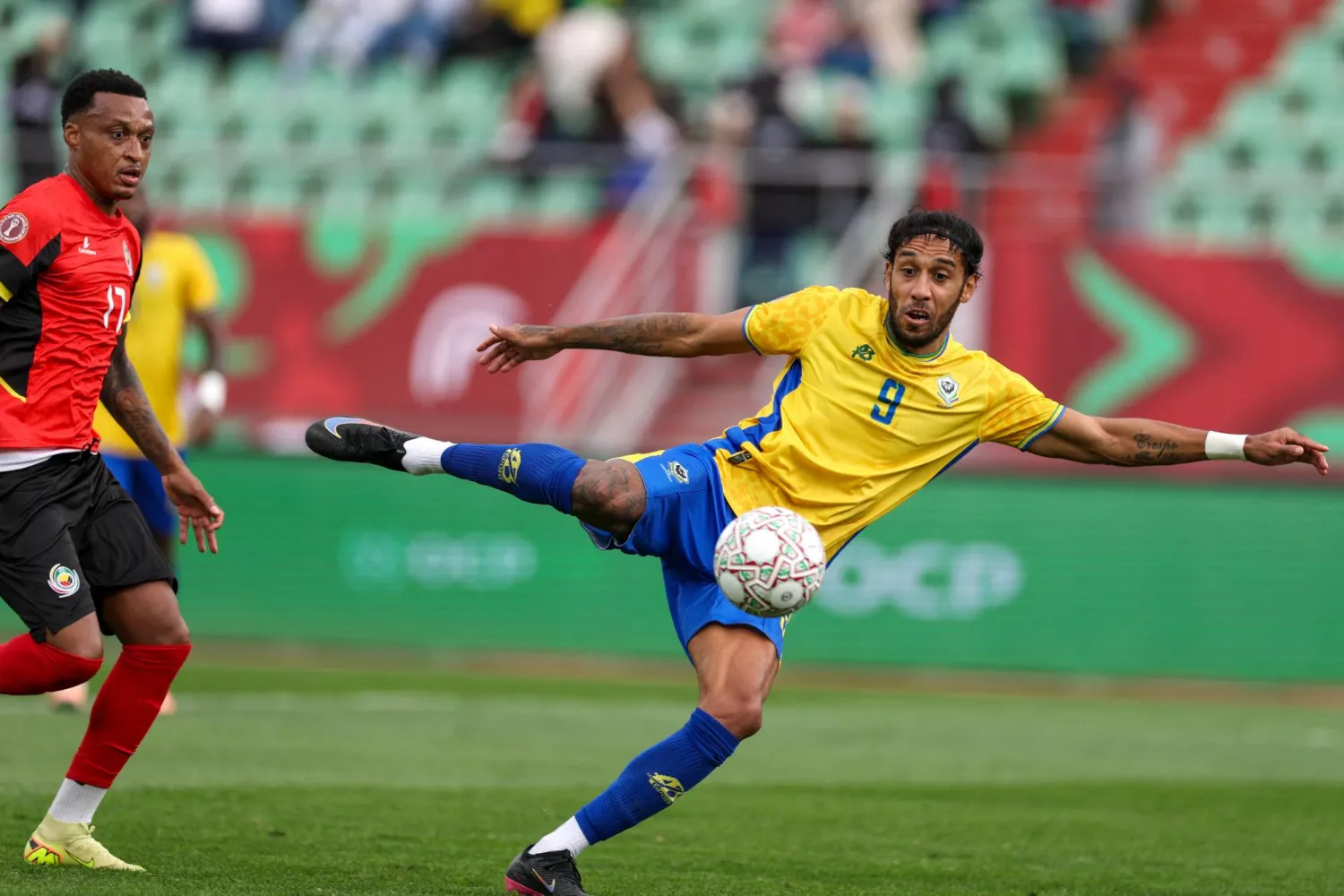  Gabon's forward #09 Pierre-Emerick Aubameyang scores a goal in front of Mozambique's defender #17 Edson Sitoe during the Africa Cup of Nations (CAN) Group F football match between Gabon and Mozambique at Grand Stadium in Agadir on December 28, 2025. (AFP)
