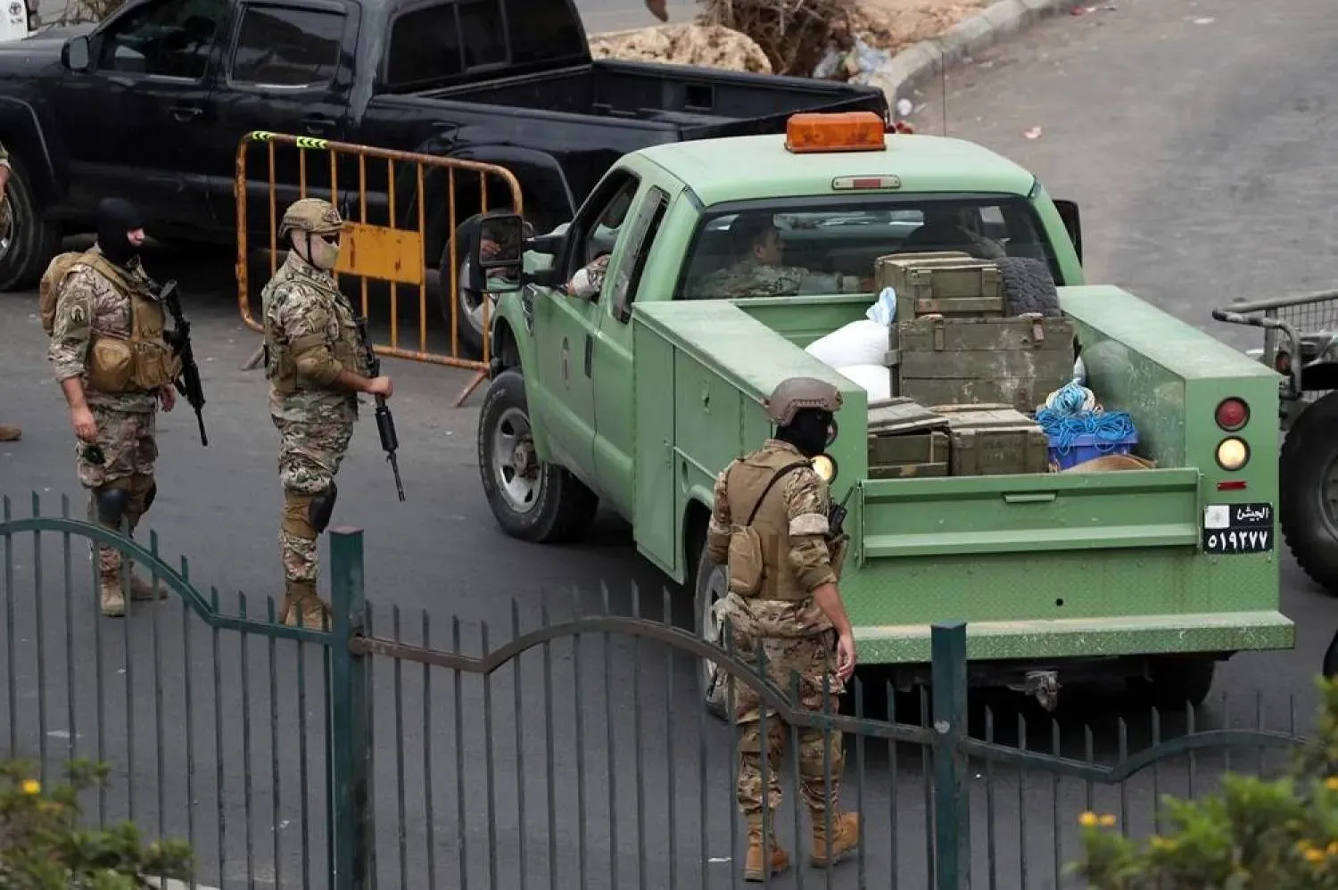 Lebanese army soldiers stand next to a truck carrying weapons at the Burj al-Barajneh Palestinian refugee camp in southern Beirut, Lebanon, 29 August 2025. (EPA)