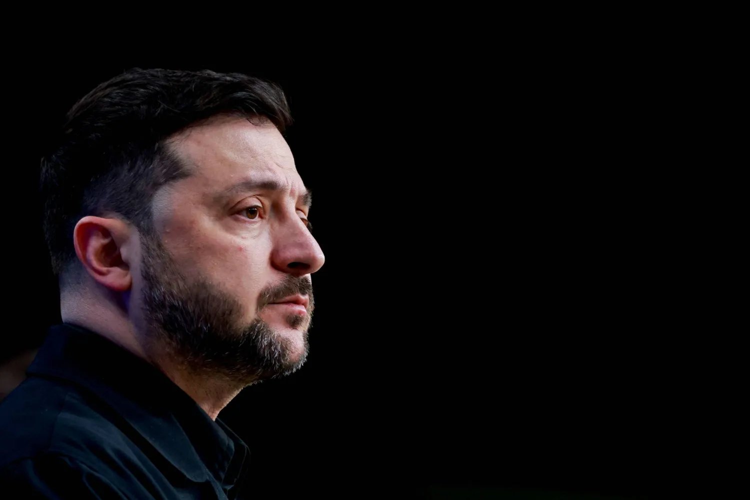 الرئيس الأوكراني فولوديمير زيلينسكي خلال مؤتمر صحافي في بروكسل يوم 18 ديسمبر (رويترز)