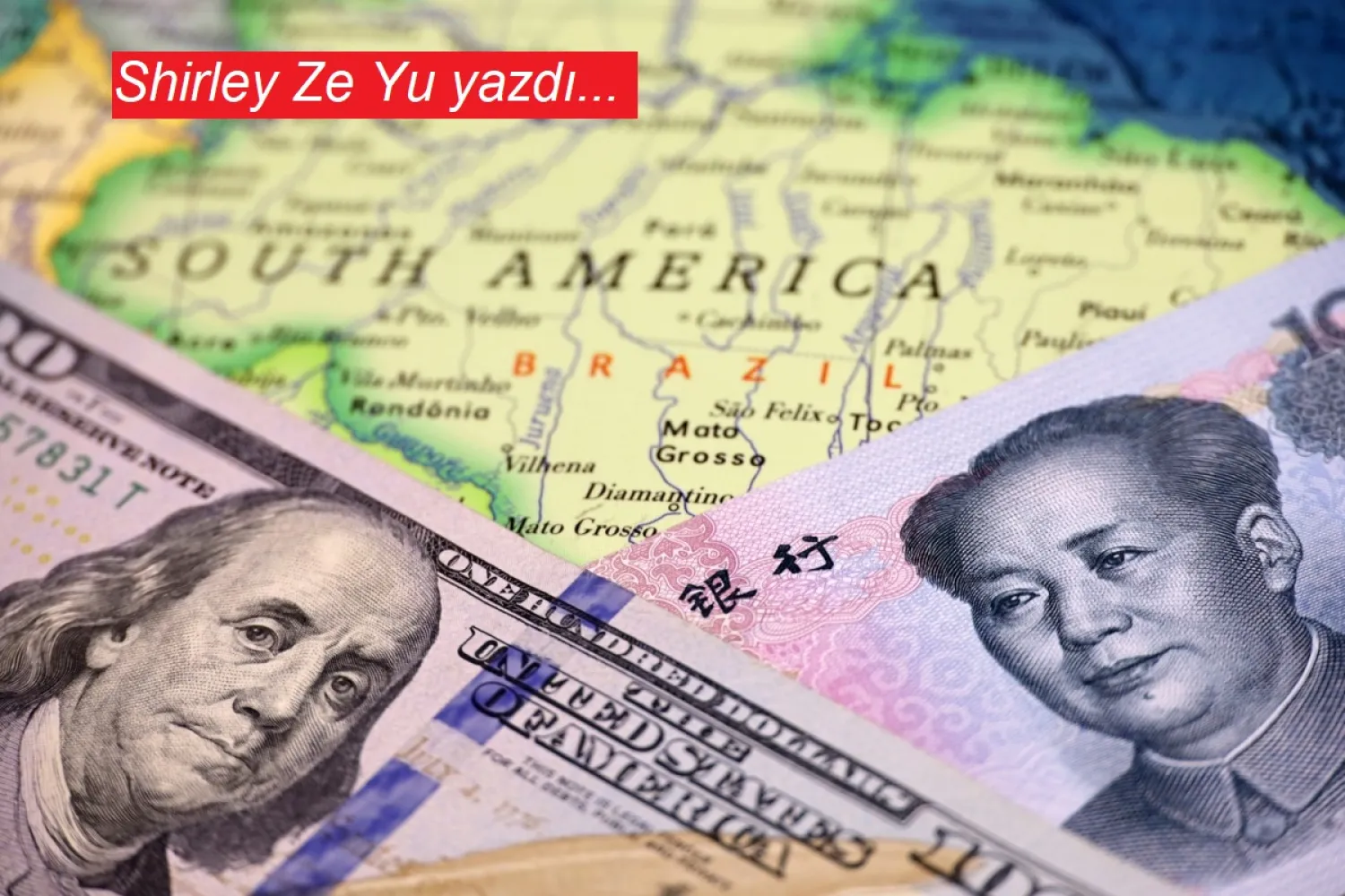 Brezilya haritası üzerinde ABD doları ve Çin yuanı (Shutterstock)