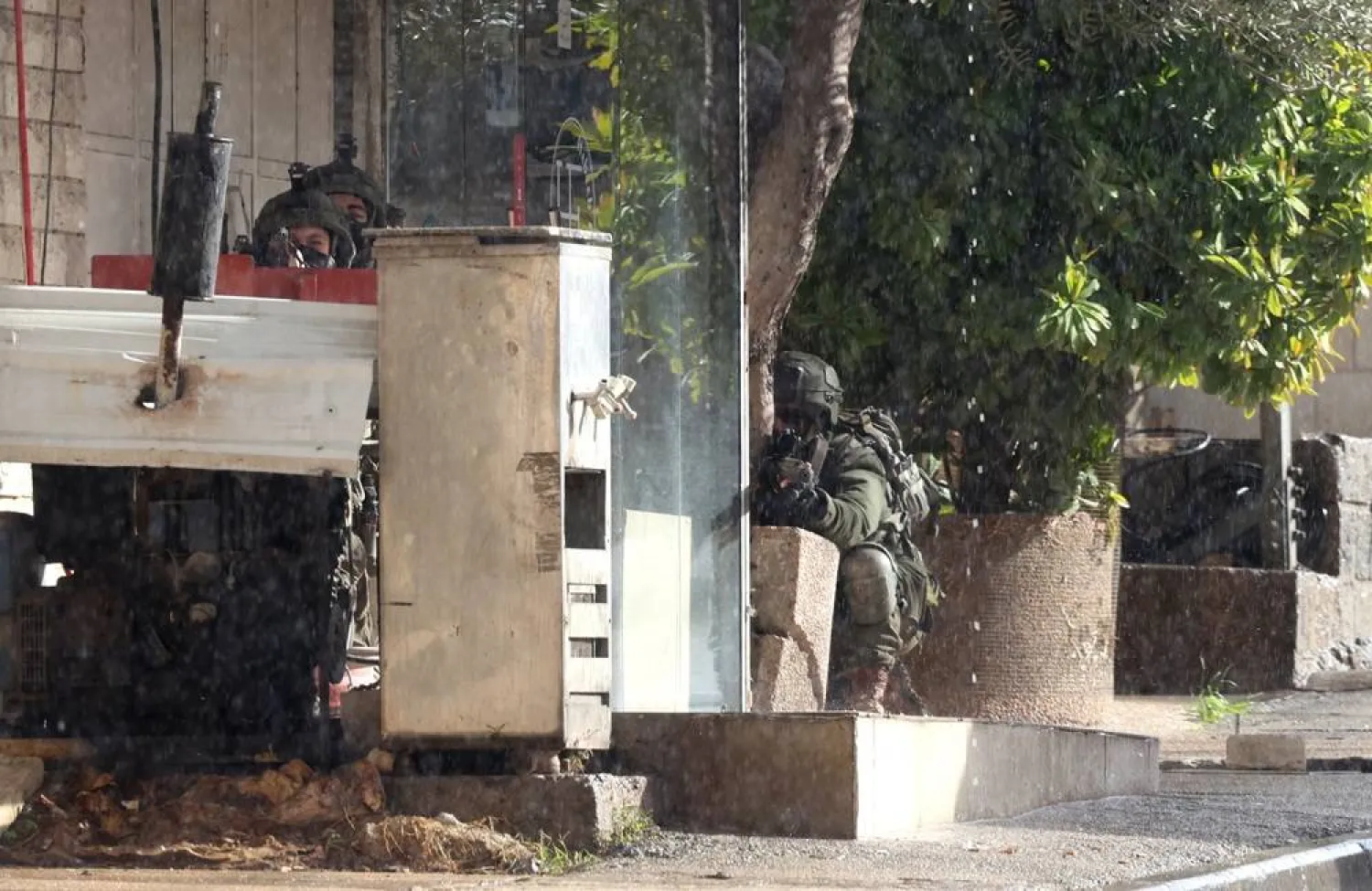 Israeli troops during a military operation in the Palestinian village of Qabatiya, near the West Bank city of Jenin, 27 December 2025. (EPA)