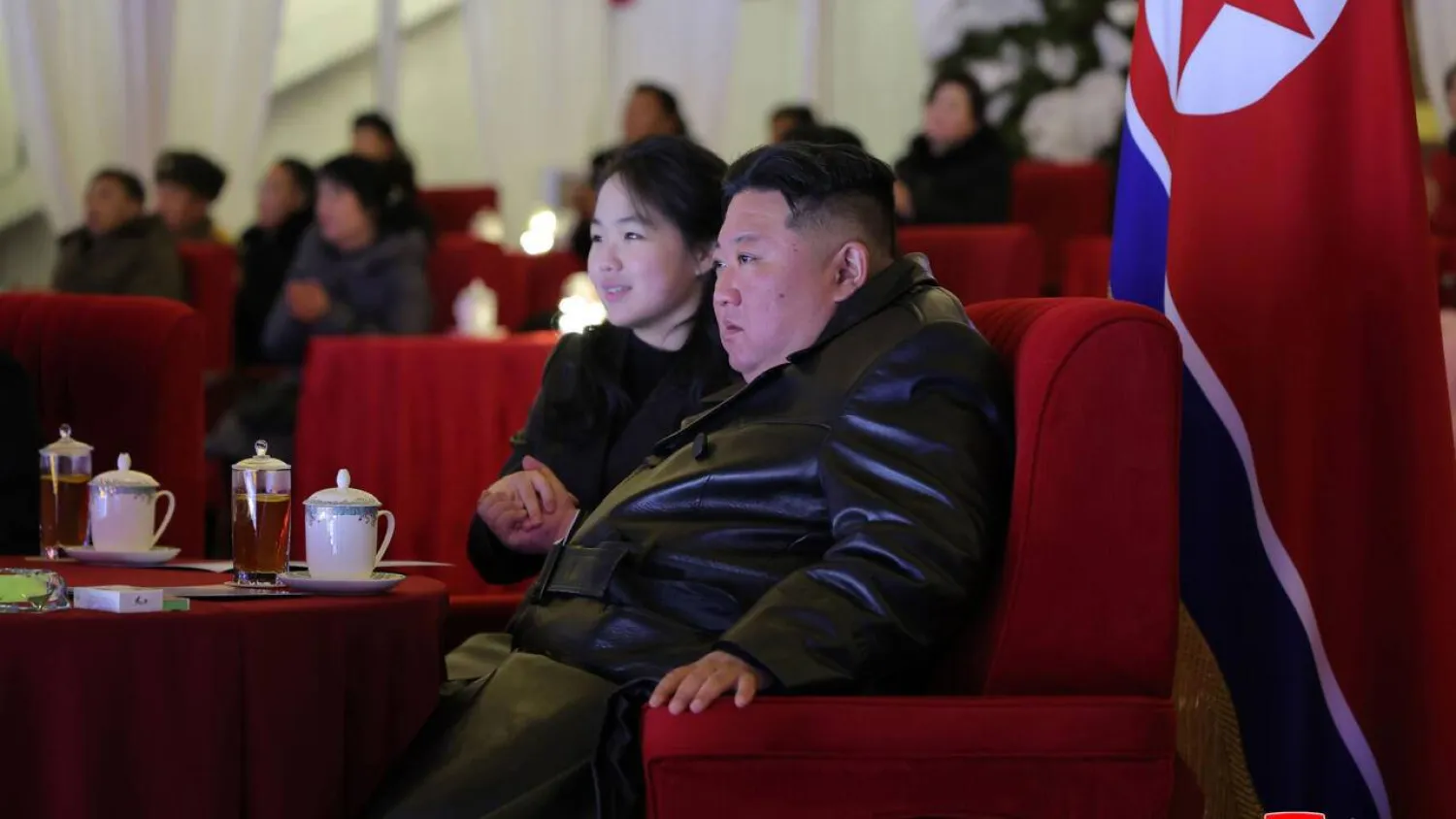 North Korean leader Kim Jong Un watching a New Year's performance with his daughter Kim Ju Ae (L) at the May Day Stadium in Pyongyang. STR / KCNA VIA KNS/AFP
