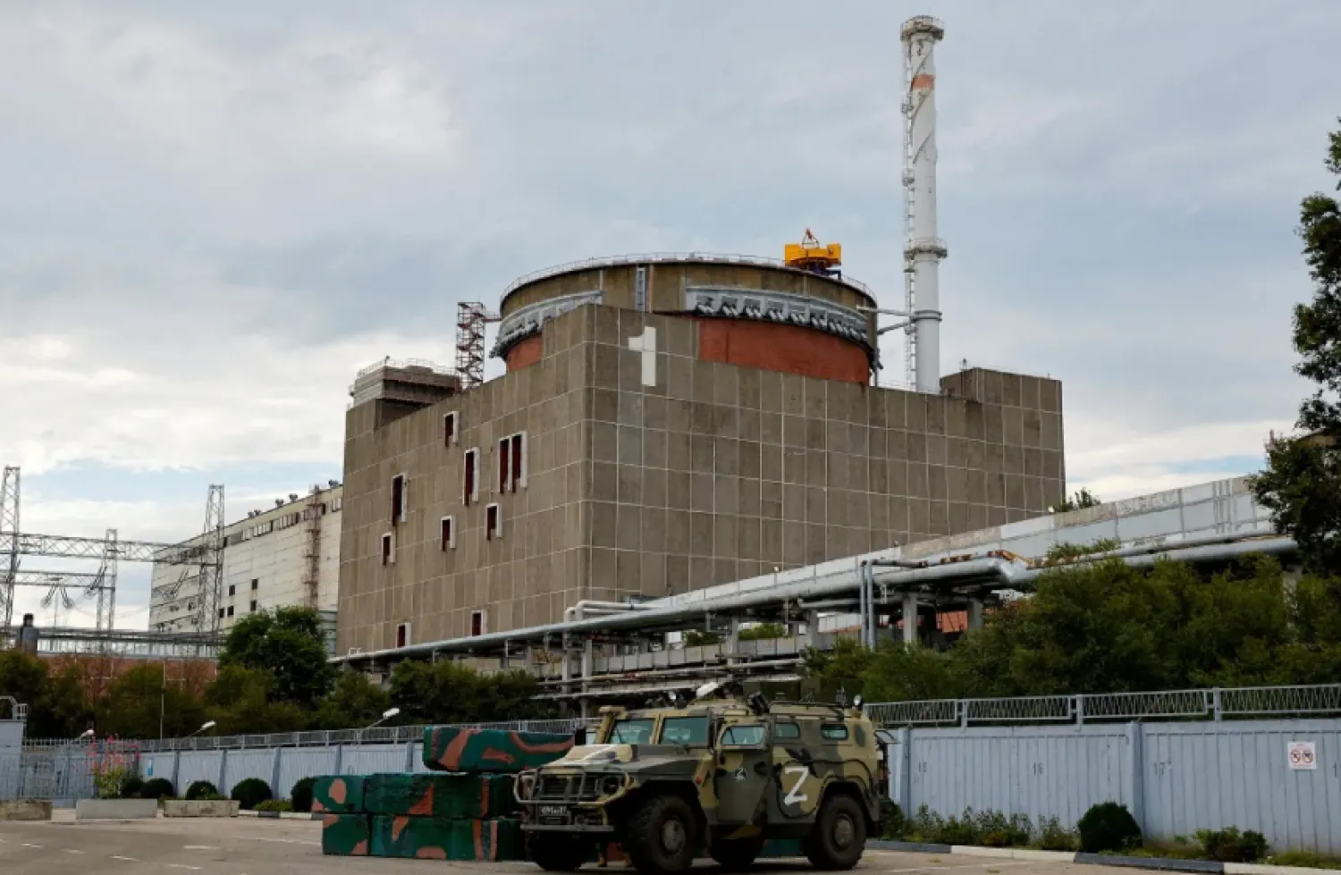 A Russian all-terrain armored vehicle is parked outside the Zaporizhzhia Nuclear Power Plant during the visit of the International Atomic Energy Agency (IAEA) expert mission in the course of Ukraine-Russia conflict outside Enerhodar in the Zaporizhzhia region, Ukraine, September 1, 2022. (Reuters)
