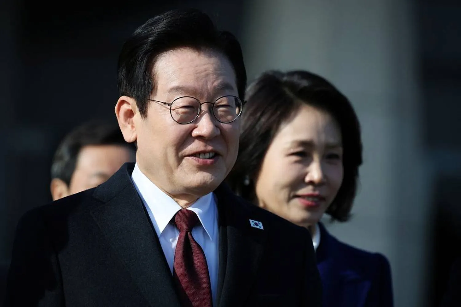  South Korean President Lee Jae Myung and his wife Kim Hye-kyung arrive at Seoul Air base as they leave for Beijing, in Seongnam, South Korea, January 4, 2026. (Reuters)
