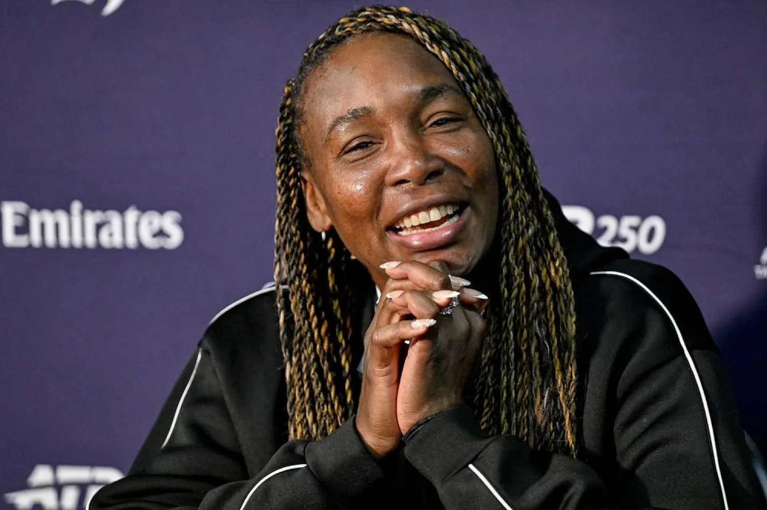  Venus Williams of the United States reacts during a press conference ahead of the Women's ASB Classic tennis tournament in Auckland, New Zealand, Sunday, Jan.4, 2026. (Alan Lee/Photosport via AP) 