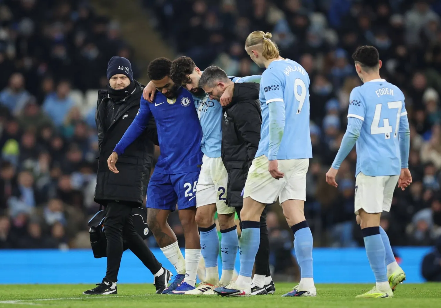 Josko Gvardiol of Manchester City leaves the pitch after sustaining an injury during the English Premier League match between Manchester City FC and Chelsea FC, in Manchester, Britain, 04 January 2026. (EPA)