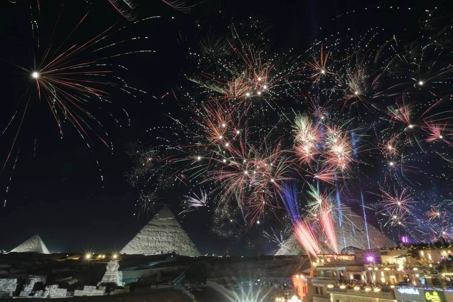  Fireworks burst over the historical site of the Giza Pyramids, on the outskirts of Cairo, Egypt, early Thursday, Jan. 1, 2026. (AP) 