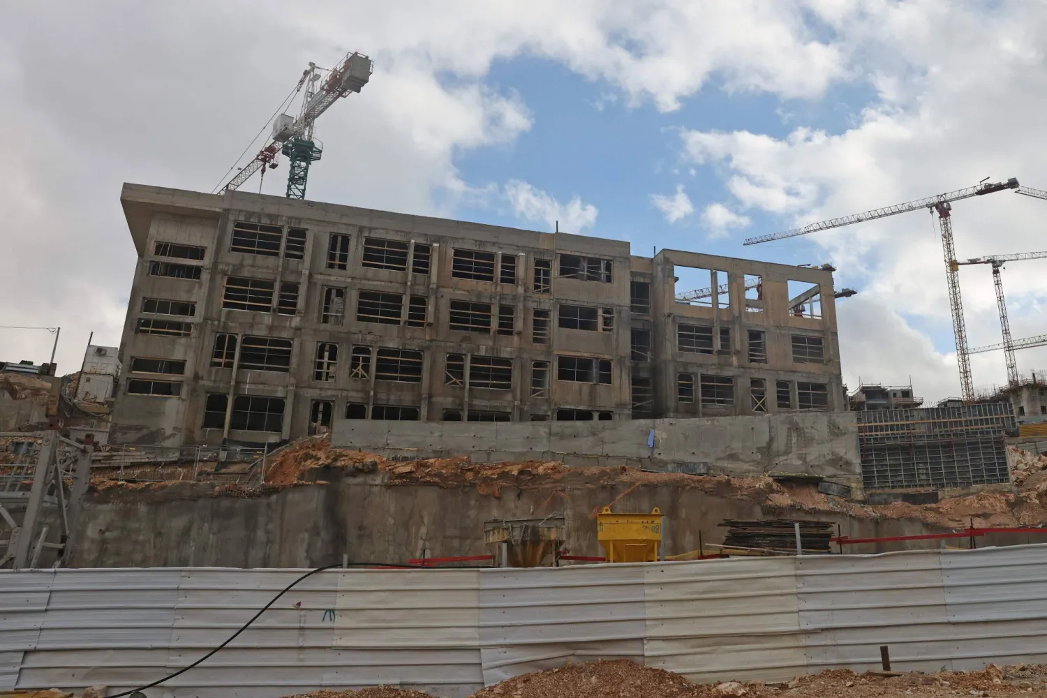 Construction cranes tower above a construction site in Givat HaMatos, an Israeli settlement suburb of Israeli-annexed east Jerusalem on January 2, 2026. (AFP)
