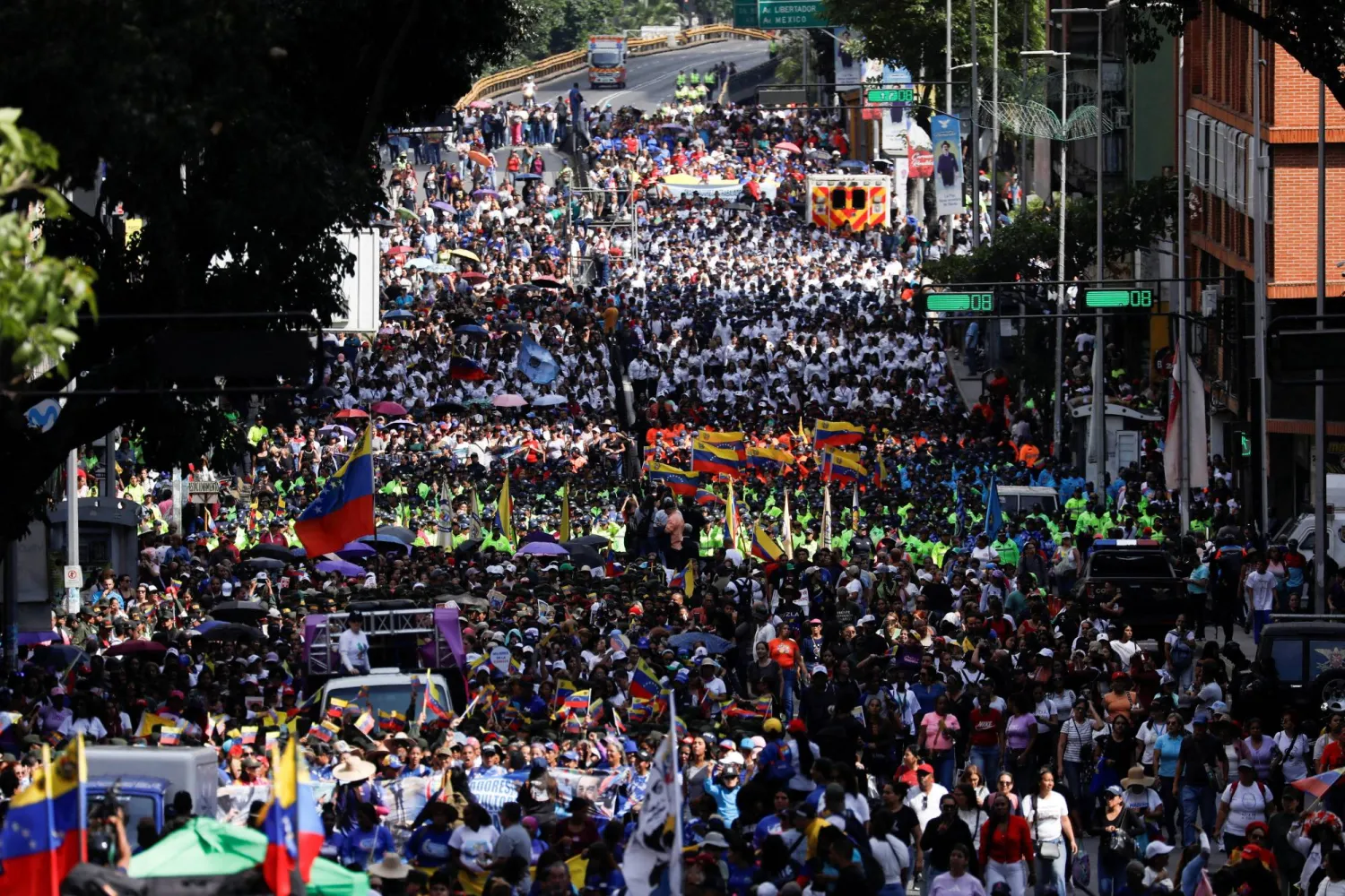 Government supporters participate in a women's march toward the office of interim President Delcy Rodriguez, days after the US launched a strike on Venezuela and captured President Nicolas Maduro and his wife Cilia Flores, in Caracas, Venezuela, January 6, 2026. (Reuters)