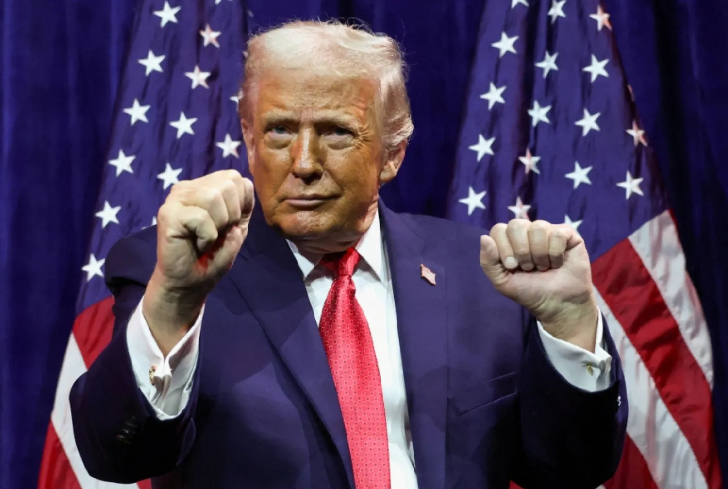  FILE PHOTO: US President Donald Trump gestures as he addresses House Republicans at their annual issues conference retreat, at the Kennedy Center, renamed the Trump-Kennedy Center by the Trump-appointed board of directors, in Washington, D.C., US, January 6, 2026. REUTERS/Kevin Lamarque/File Photofu.