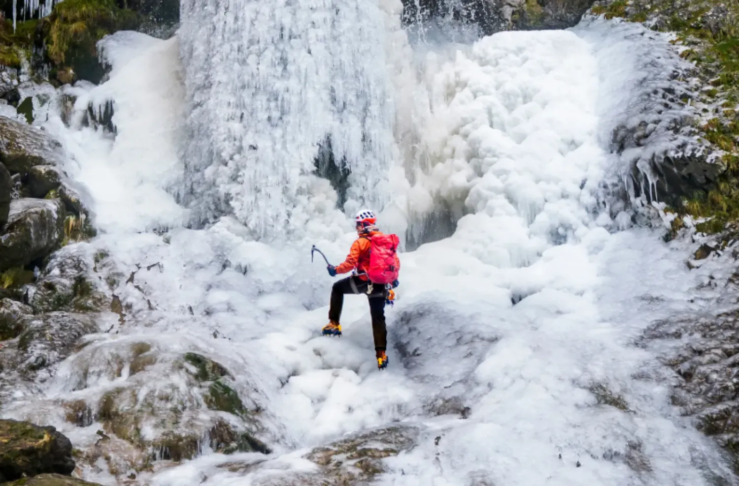 Lost Earth Adventures' instructor Mick Ellerton climbs a frozen waterfall in Gordale Scar near Malham Cove in the Yorkshire Dales National Park, as ice warnings are in place across the UK ahead of a storm which is set to bring heavy snow later in the week, on Wednesday Jan. 7, 2026. (Danny Lawson/PA via AP)