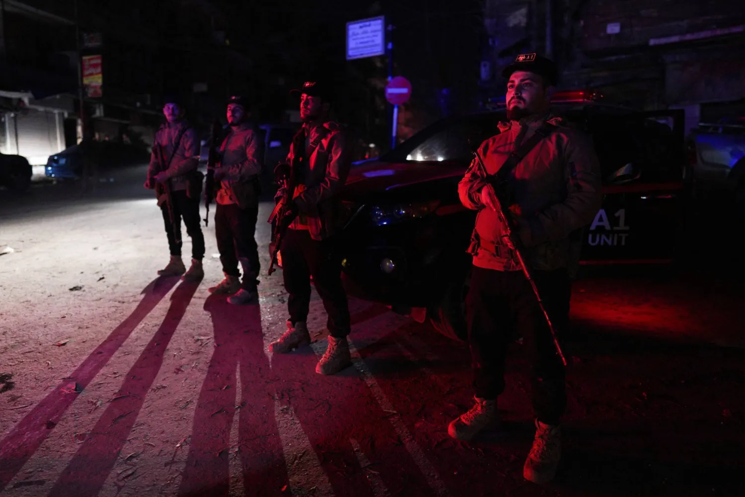 Security forces affiliated with the Ministry of the Interior stand guard in the Ashrafieh neighborhood, which they have taken control of, according to the Ministry of the Interior, following battles with the Syrian Democratic Forces, in Aleppo, Syria, January 9, 2026. (Reuters)
