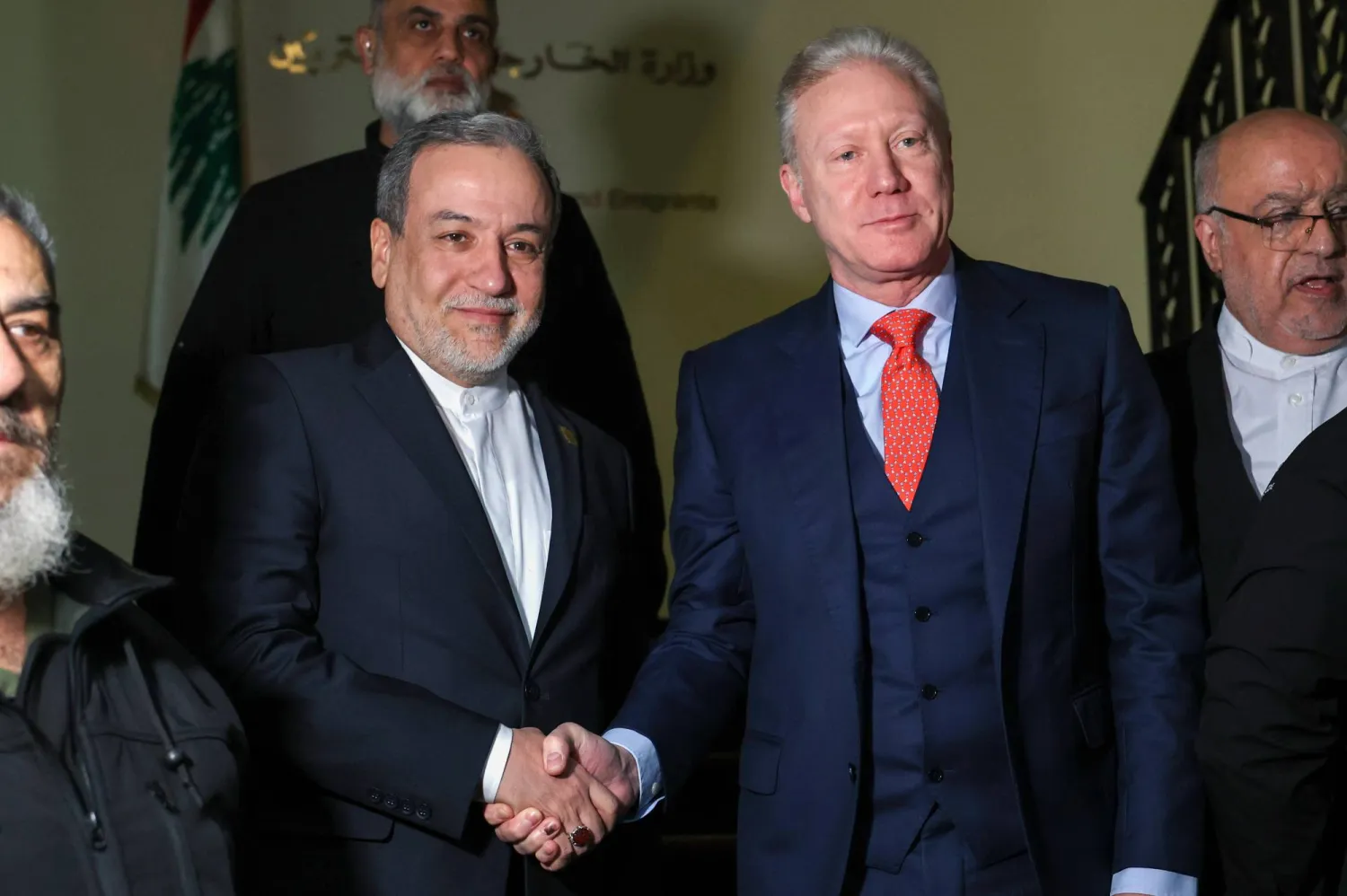 Iranian Foreign Minister Abbas Araghchi (L) shakes hands with Lebanese Minister of Foreign Affairs and Emigrants Youssef Raggi (R) at the Foreign Ministry in downtown Beirut, Lebanon, 09 January 2026. (EPA) 