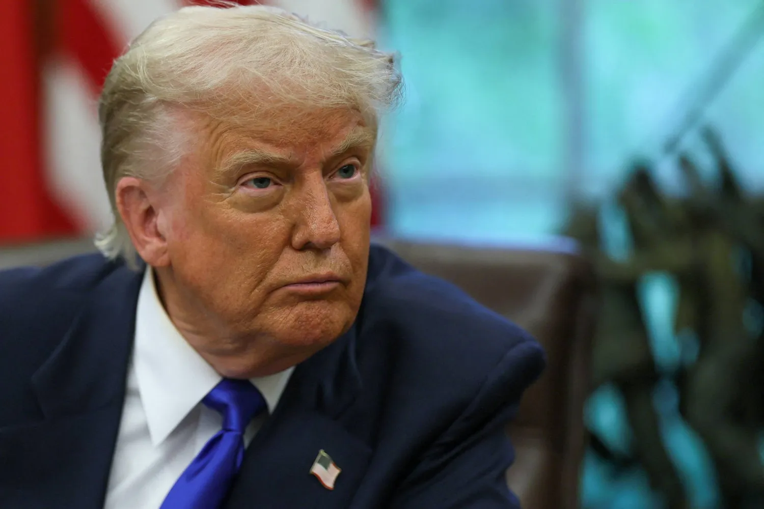 US President Donald Trump looks on as he signs executive orders and proclamations in the Oval Office at the White House, in Washington, DC, US, May 5, 2025. (Reuters)