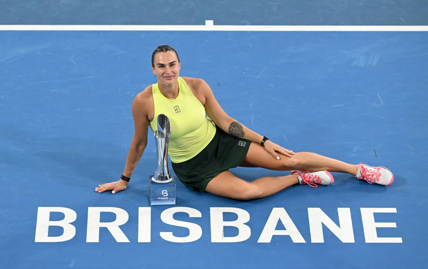 11 January 2026, Australia, Brisbane: Belarusian tennis player Aryna Sabalenka poses for photographs after winning the Women's Singles final tennis match against Ukraine's Marta Kostyuk at the Brisbane International tennis tournament at Pat Rafter Arena. Photo: Dave Hunt/AAP/dpa