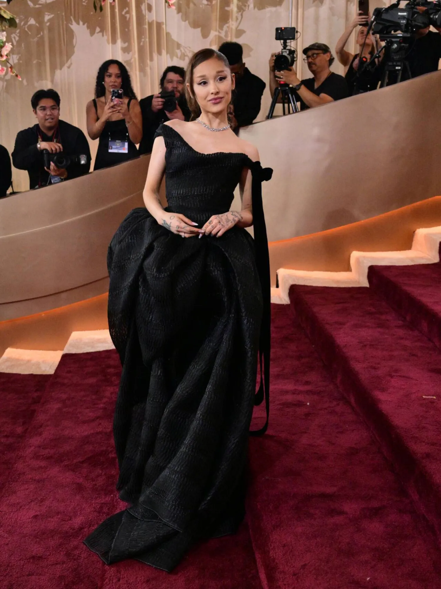 Ariana Grande is a nominee for her turn as Glinda in 'Wicked: For Good'. Frederic J. Brown / AFP