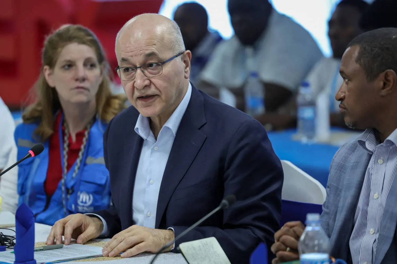 United Nations (UN) High Commissioner for Refugees, Barham Salih (C) holds a meeting with local administrative and security leaders following his arrival at the Kakuma refugee complex in Kakamu on January 11, 2026. (AFP)
