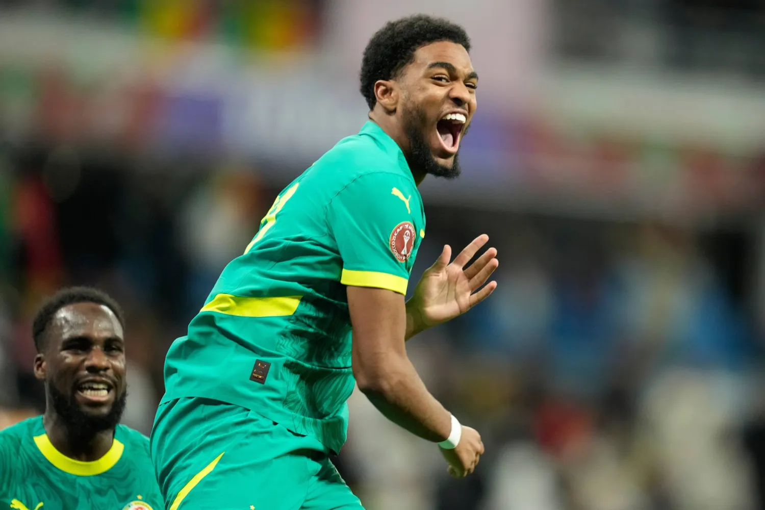 Senegal's Ibrahim Mbaye celebrates after scoring during the Africa Cup of Nations best of 16 soccer match between Senegal and Sudan in Tangier, Morocco, Saturday, Jan. 3, 2026. (AP)