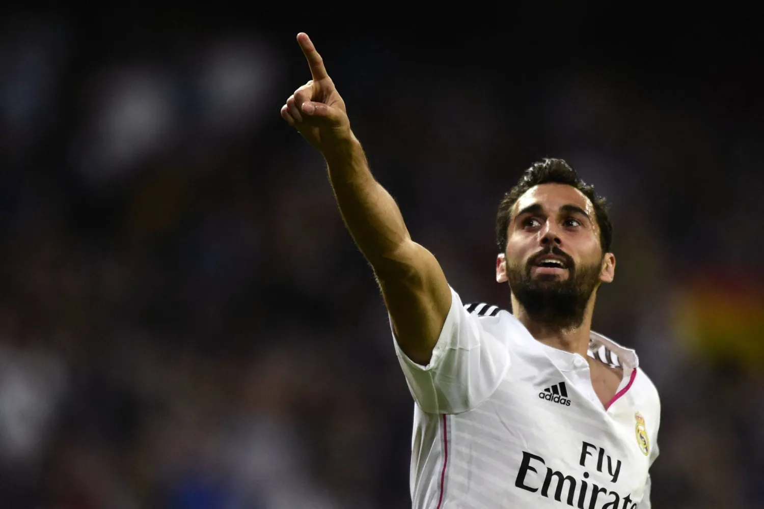 Real Madrid's defender Alvaro Arbeloa celebrates after scoring a goal during the Spanish league football match Real Madrid CF vs UD Almeria at the Santiago Bernabeu stadium in Madrid on April 29, 2015. (AFP)