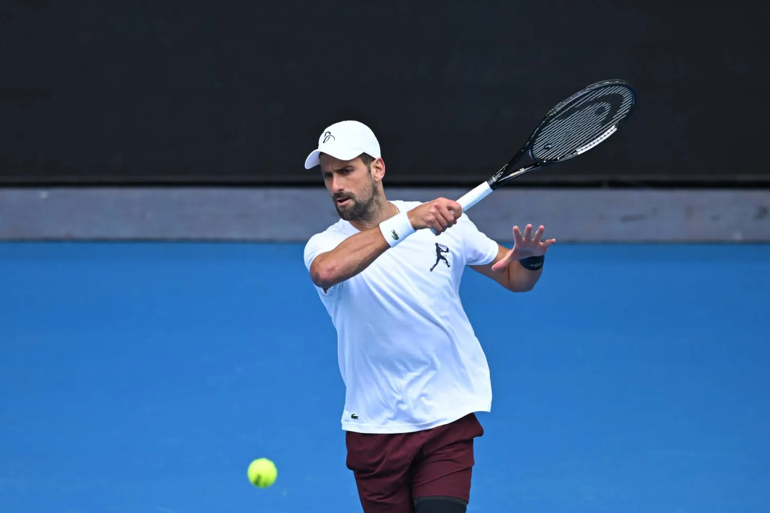 13 January 2026, Australia, Melbourne: Serbian tennis player Novak Djokovic in action during a practice session ahead of the Australian Open tennis tournament at Melbourne Park. (dpa)