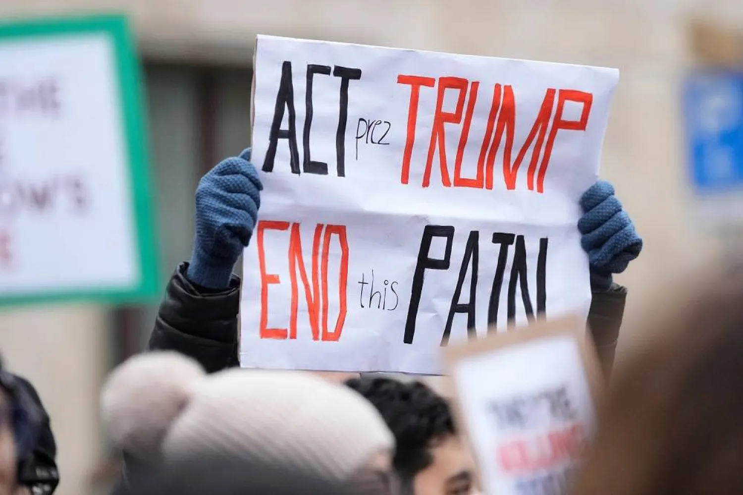 Protesters participate in a demonstration supporting protesters in Iran, in front of the US Consulate, Milan, Italy, Tuesday, Jan. 13, 2026. (AP)