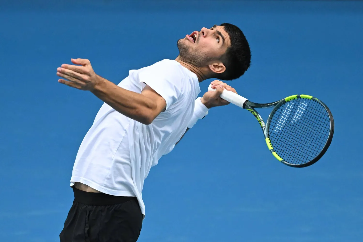 Carlos Alcaraz of Spain practices ahead of the Australian Open tennis tournament in Melbourne, Australia, 13 January 2026. (EPA)