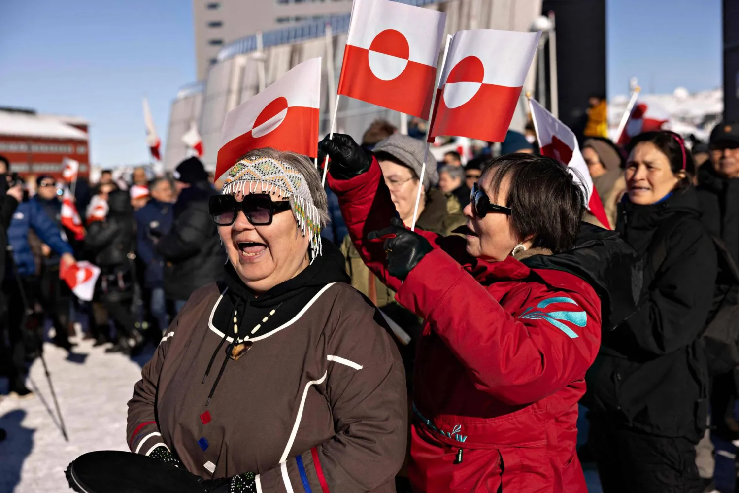 (FILES) Protesters attend a march to the US consulate during a demonstration, under the slogan 'Greenland belongs to the Greenlandic people', in Nuuk, Greenland, on March 15, 2025.  (Photo by Christian Klindt Soelbeck / Ritzau Scanpix / AFP)