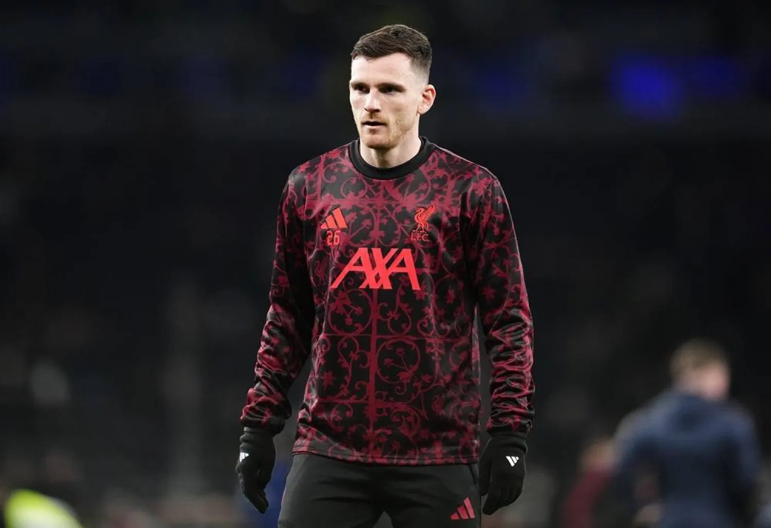 04 October 2025, United Kingdom, London: Liverpool's Andy Robertson warms up prior to the start of the English Premier League soccer match between Chelsea and Liverpool at Stamford Bridge. (dpa)