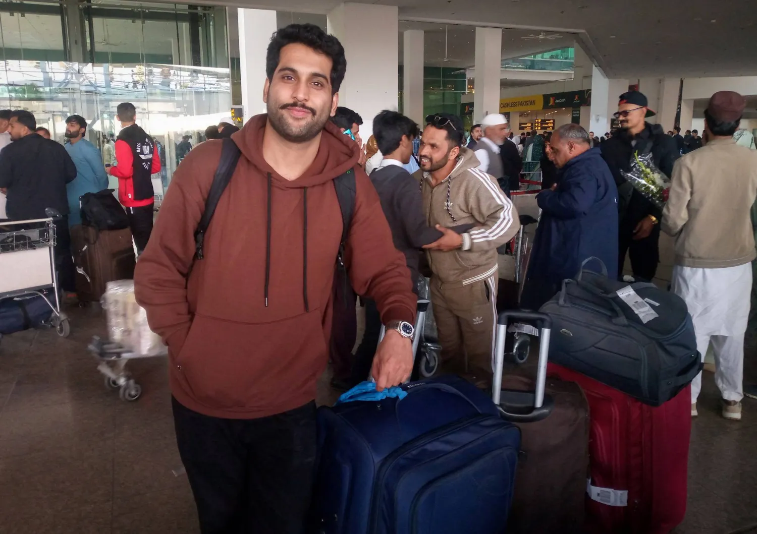  A Pakistani medical student Arslan Haider waits at the airport after arriving from Tehran on a commercial flight amid the ongoing nationwide protests in Iran, in Islamabad, Pakistan, January 15, 2026. (Reuters)