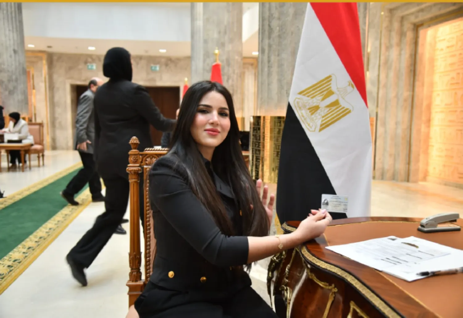 النائبة ريهام أبو الحسن خلال استلام كارنيه عضوية المجلس (حسابها على فيسبوك)