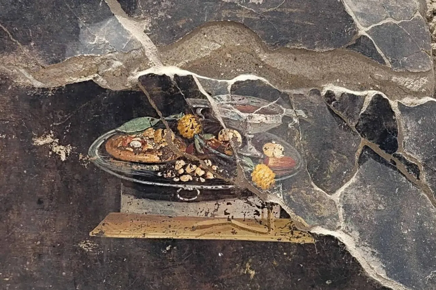 The fresco on the wall of a house in Pompeii that dates back 2,000 years (AFP)