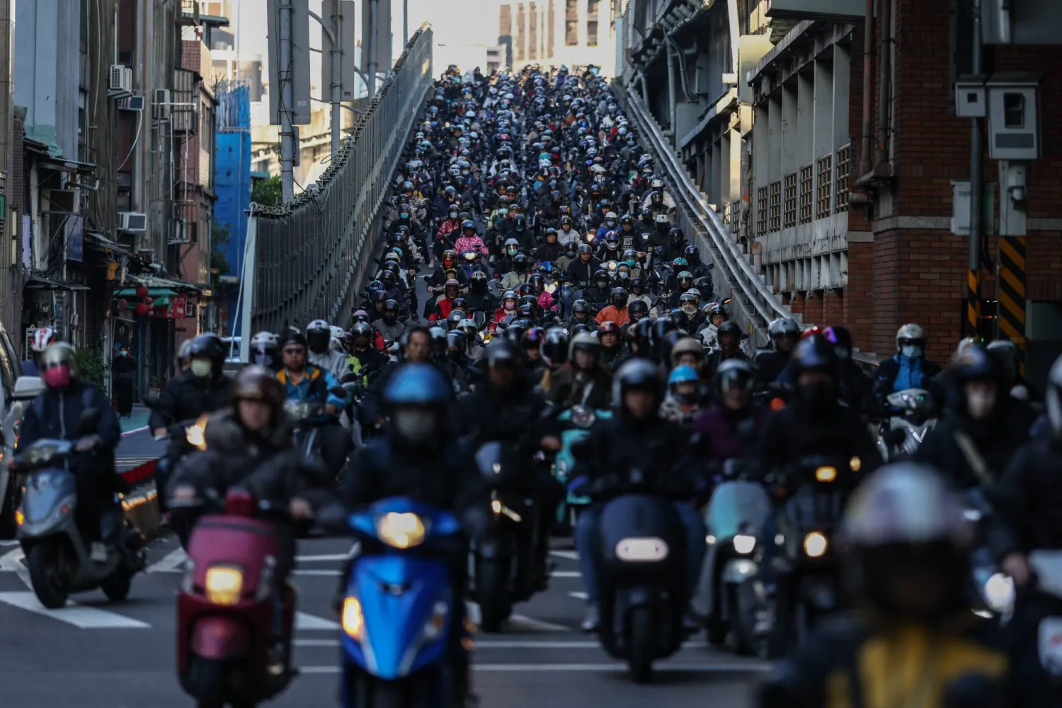Motorists maneuver at the street in Taipei, Taiwan, 14 January 2025. EPA/RITCHIE B. TONGO